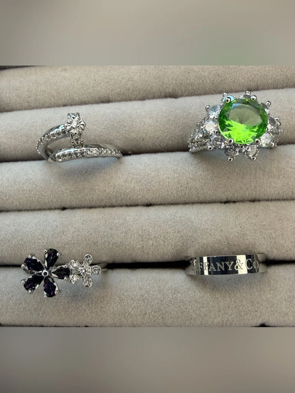 Lot of four silver tone rings